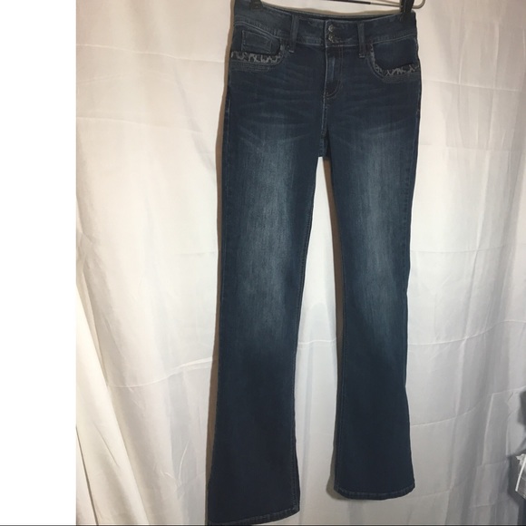 Cache Denim - Cache jeans with leopard print details on pockets